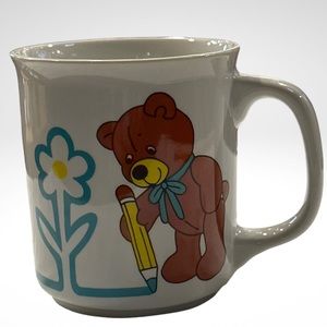 J.S.N.Y. Coffee Cup Mug with Bear Holding and Drawing with a Colored Pencil